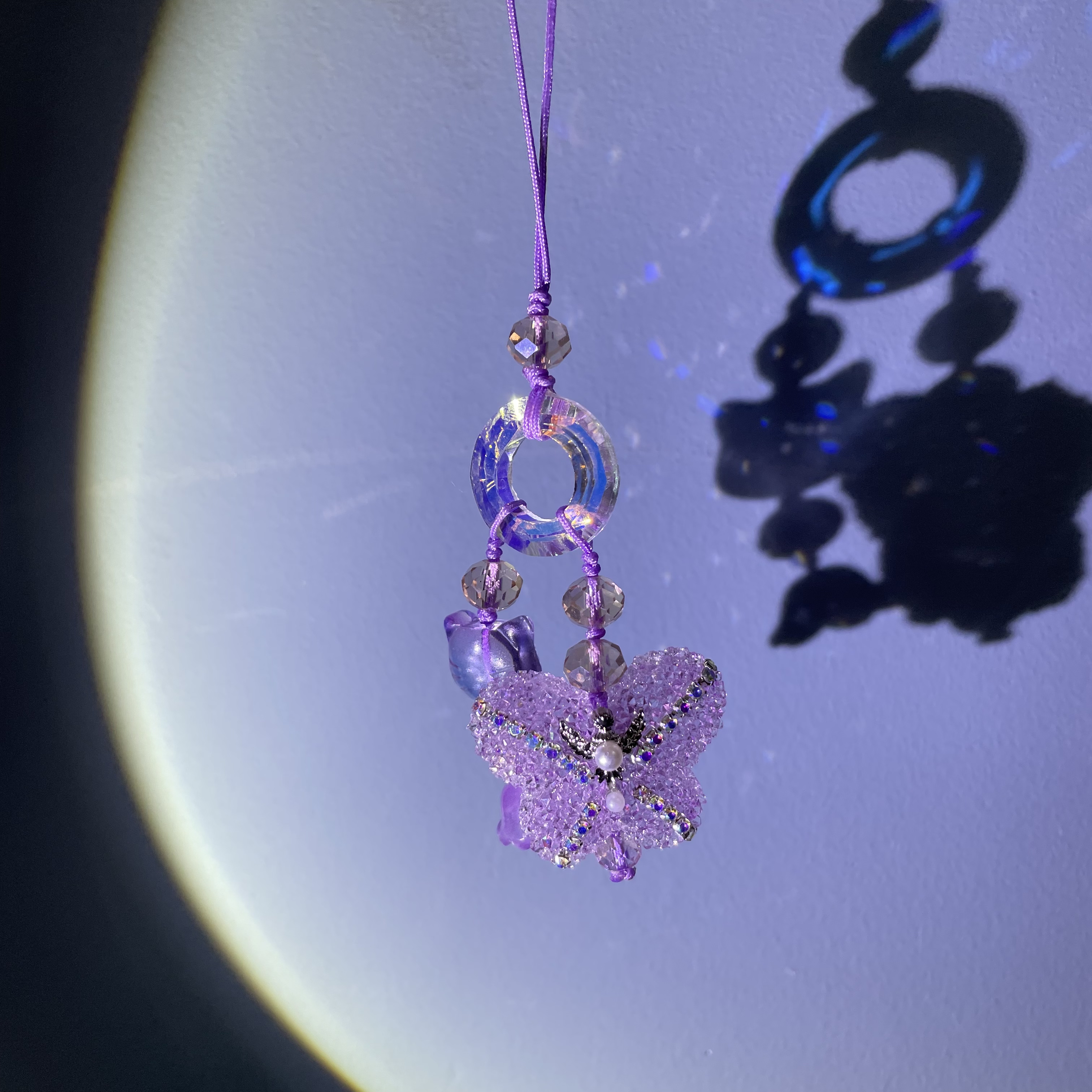 编织绳编紫色砂糖蝴蝶手机坠C873