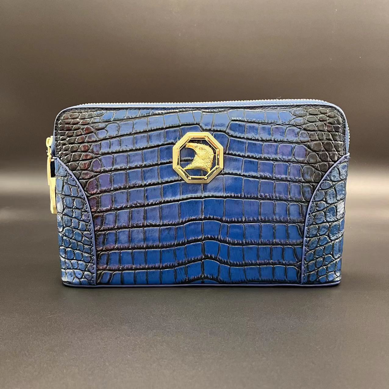 E肚克莱因蓝手工擦色双拉手拿包