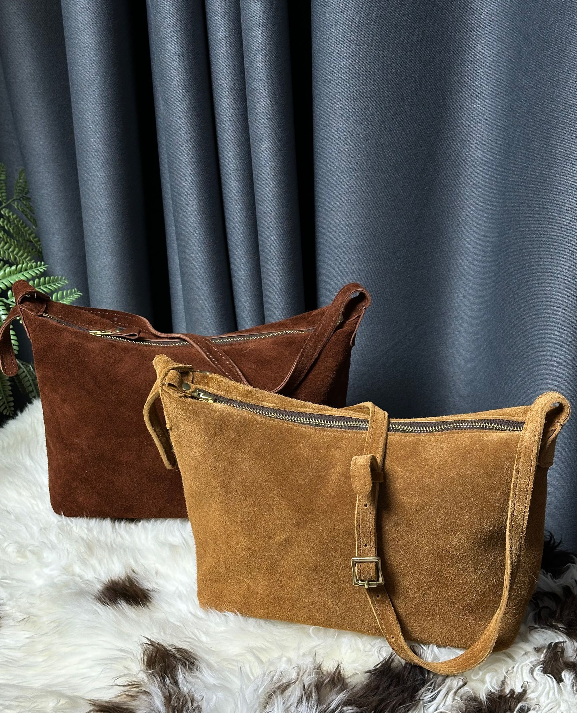 也牛.头层反绒牛皮休闲文艺复古简约腋下斜挎包