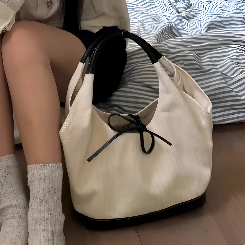 超韩系撞色系带帆布包包女2025春季新款大容量水桶包手提单肩包