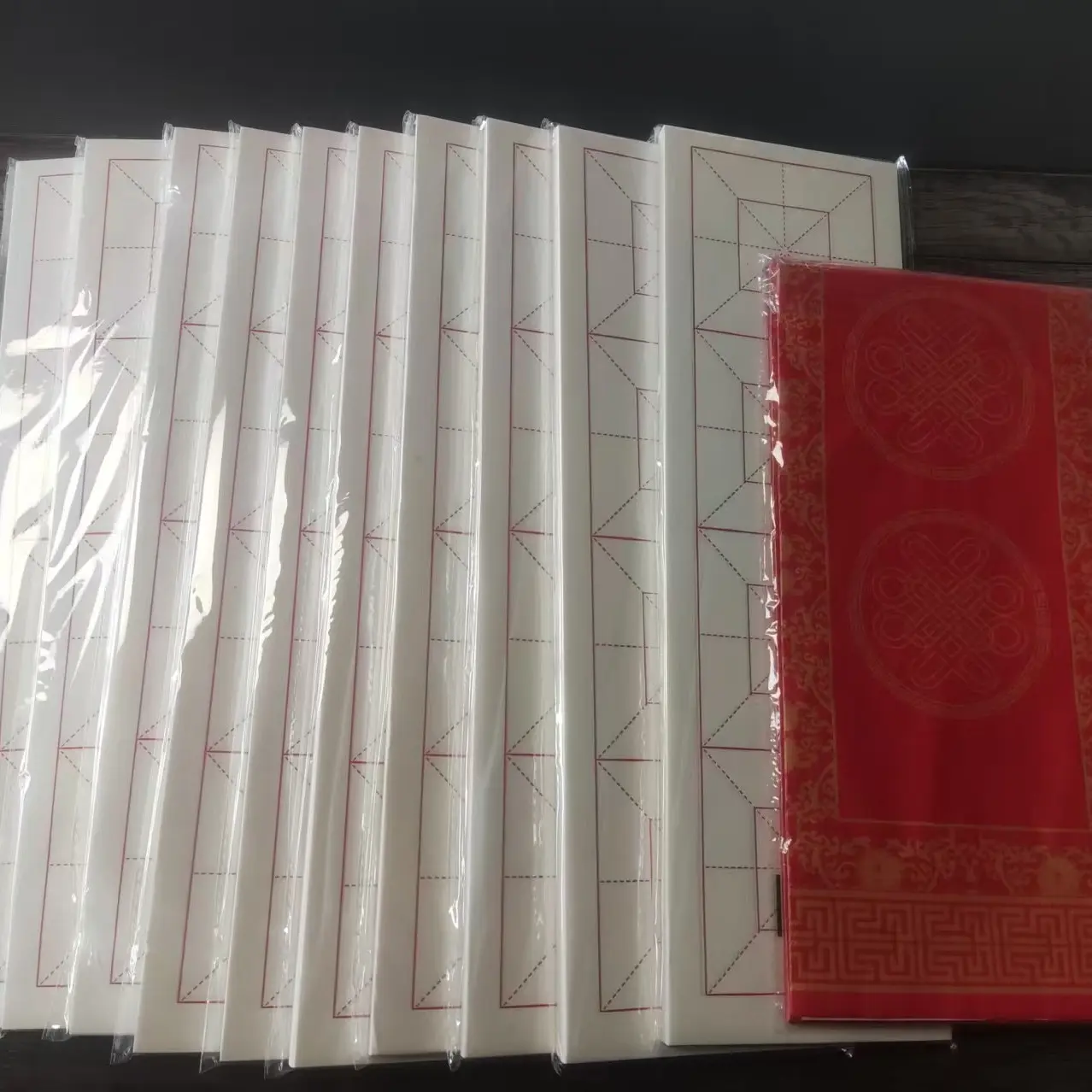 四格米字格半生熟宣纸毛笔书法练习专用纸+蜡染对联5幅（17*104cm）