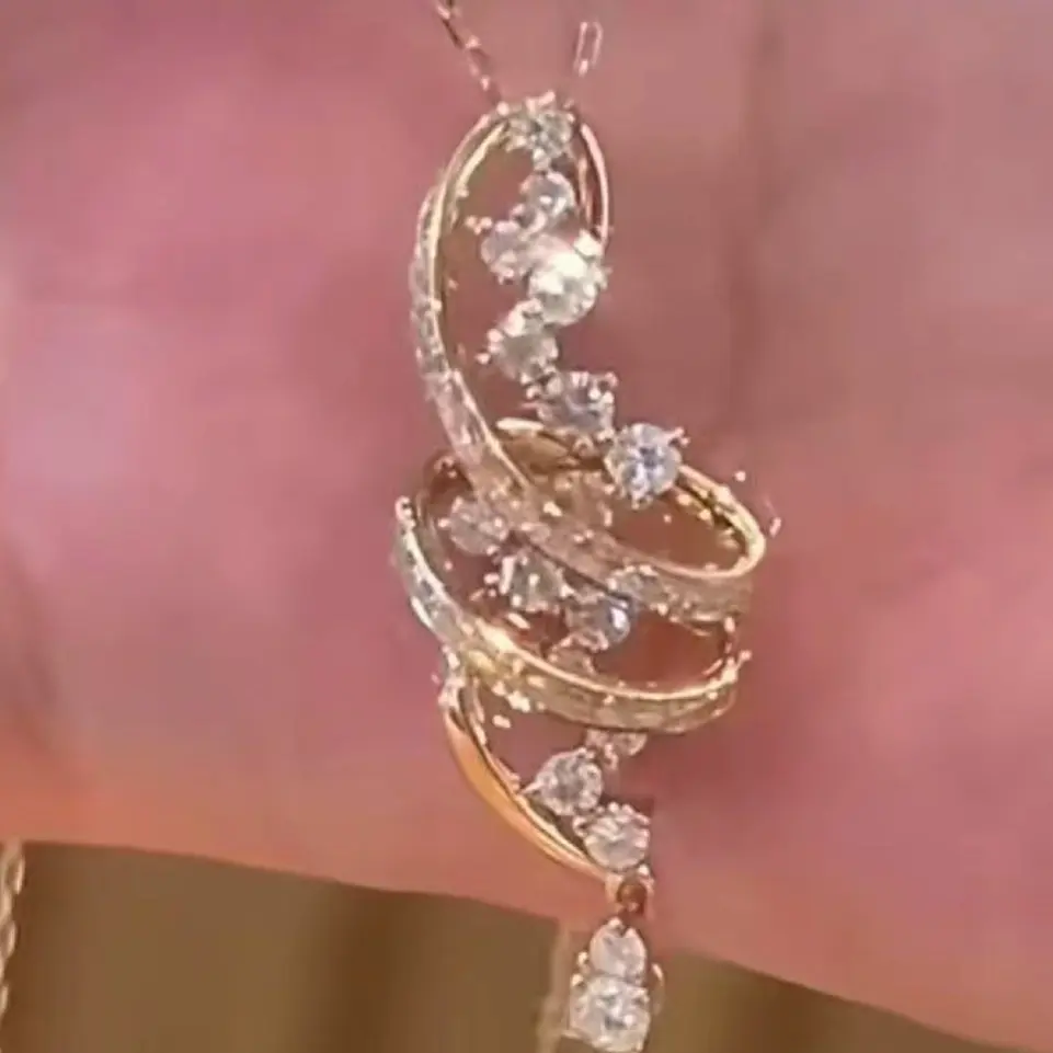 18 K金61分钻石旋转的音符吊坠轻奢时尚百搭气质小众