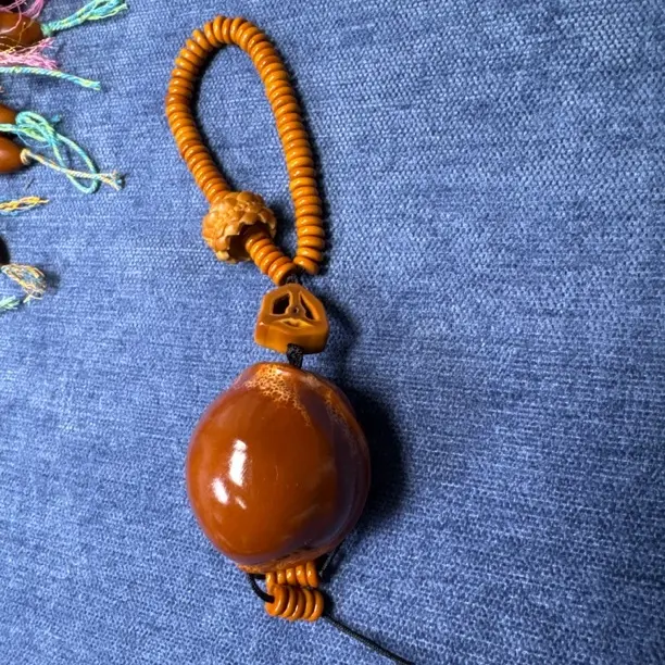 纯手工橄榄核雕刻独特造型大呲花文玩手把件