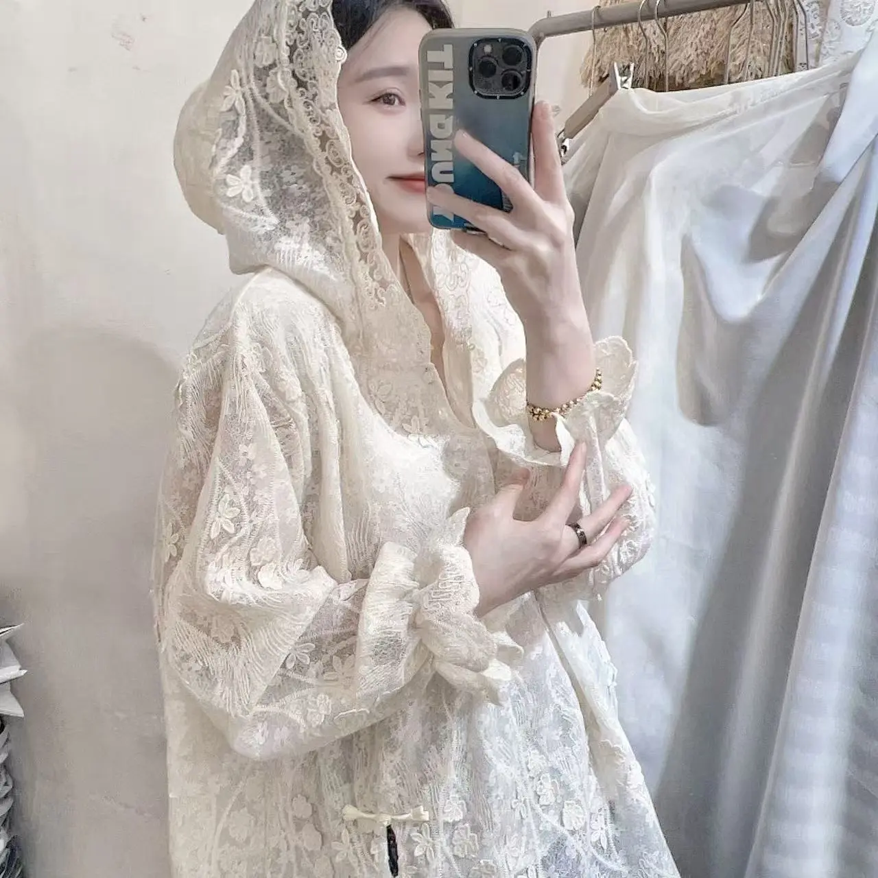 (琉璃花漾)气质显瘦中长款重工钩花蕾丝拼接连帽女士上衣