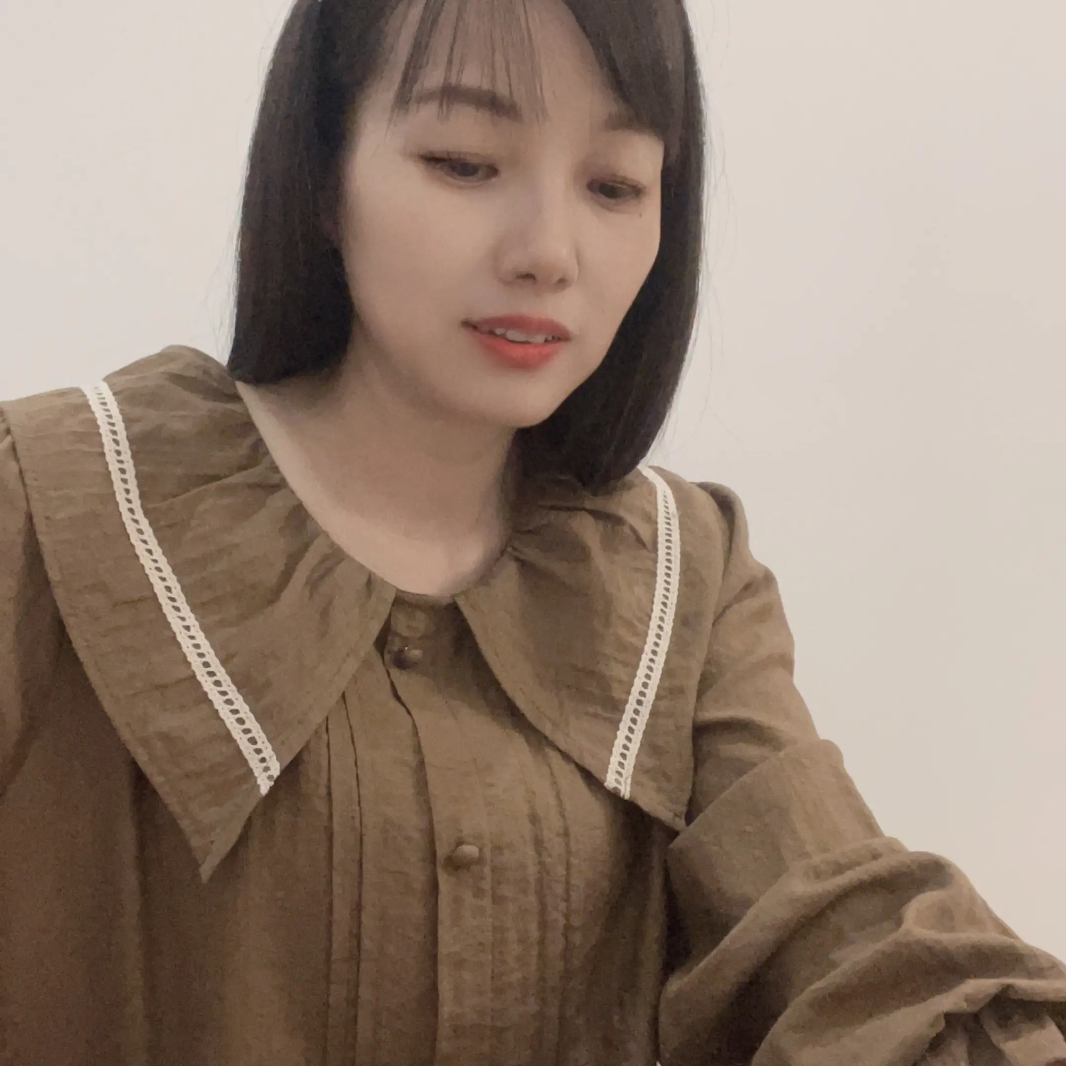秋季新款女性高档长袖减龄娃娃领小衫遮肚子显瘦气质打底衫