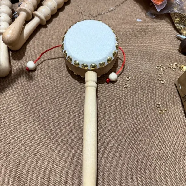 安抚哄娃传统实木手工羊皮拨浪鼓榉木