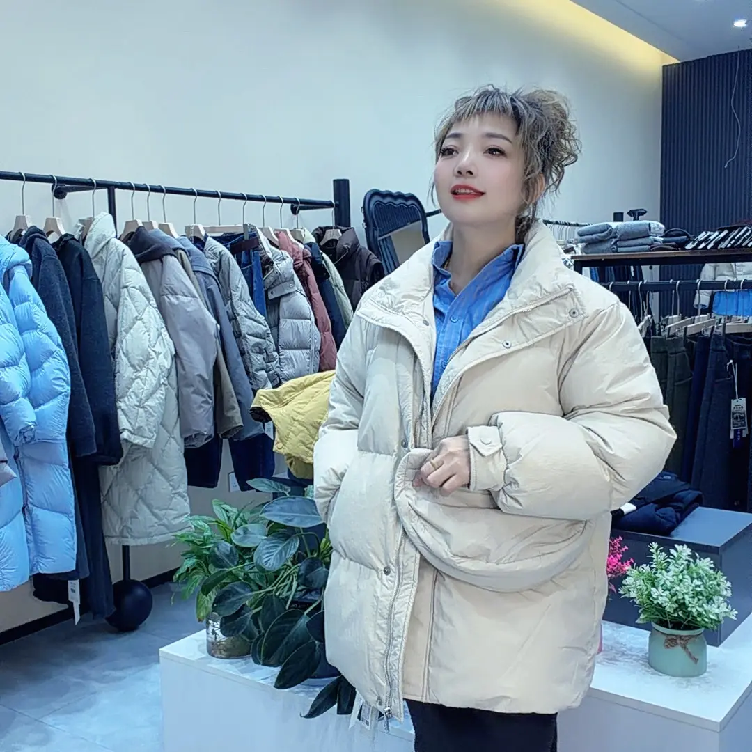 冬季新款韩版简约收腰白鸭绒保暖女