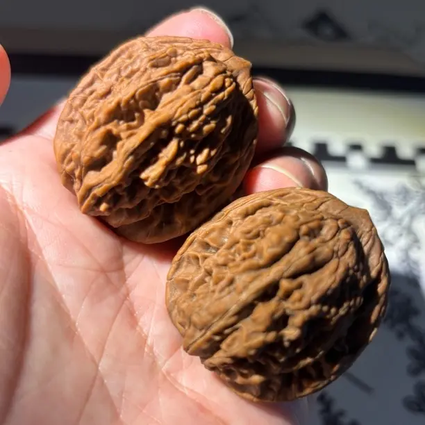 文玩核桃手把件四座楼狮子头麒麟纹蓟县虎头王全品收藏级盘玩