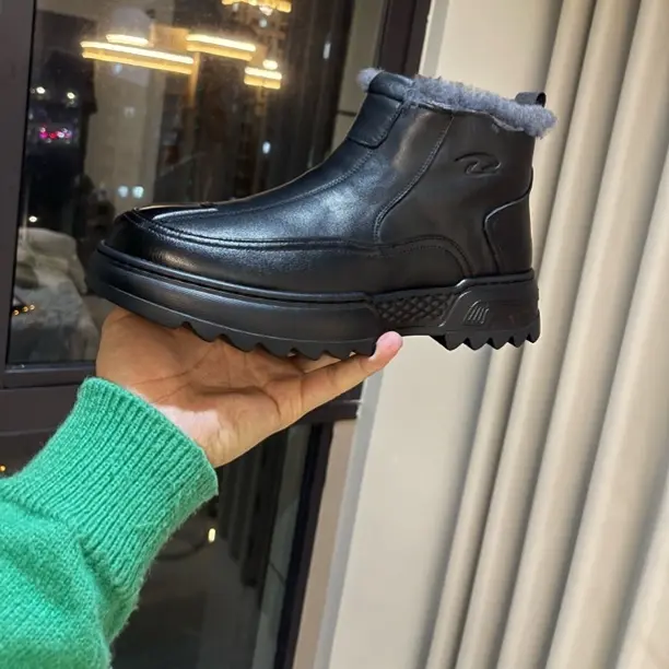 男士冬季真皮一体高帮防滑保暖户外雪地靴秋冬加绒厚底百搭时尚