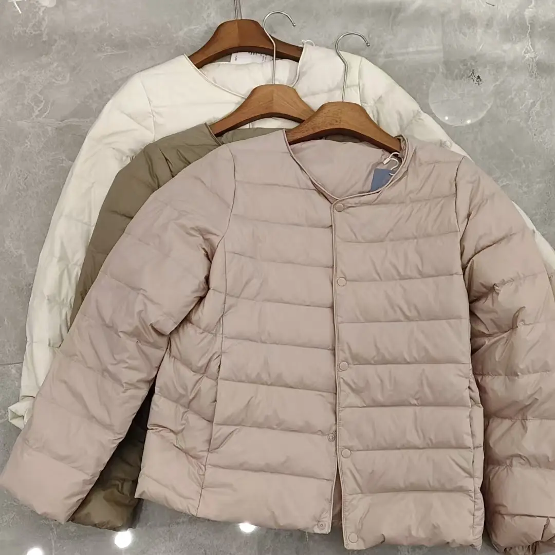 3903常规款圆领单排扣纯色短款轻薄上衣