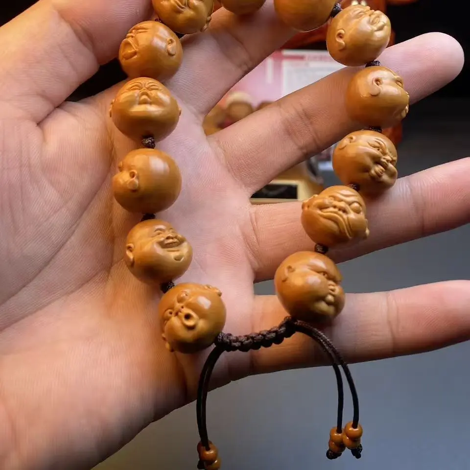 橄榄核正圆人生百态