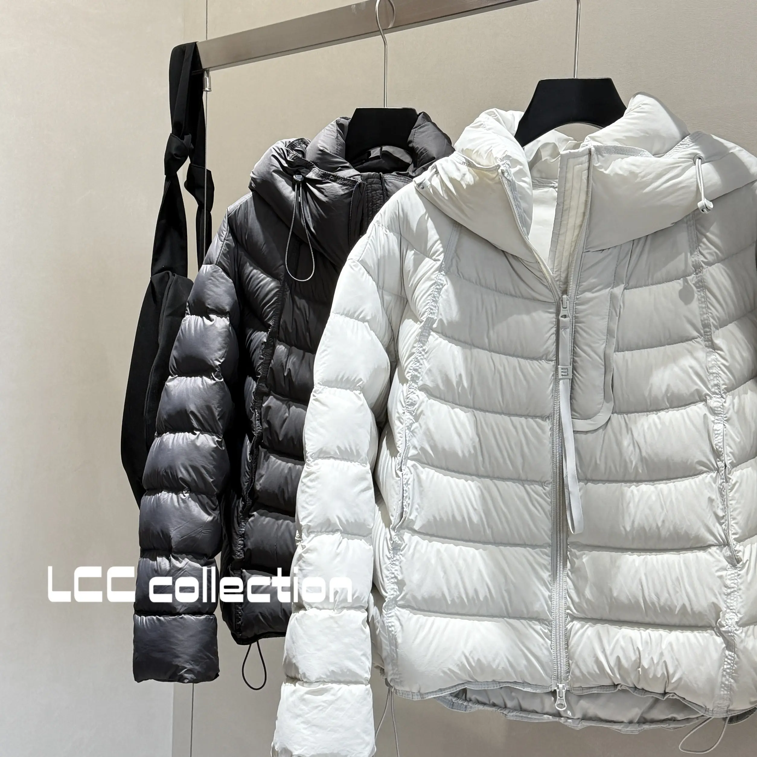 简约时尚百搭云感泡芙白鸭绒连帽女短款加厚宽松轻软外套冬