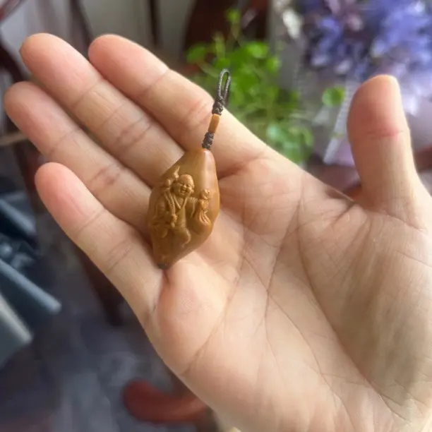 橄榄核单子浮雕弥勒