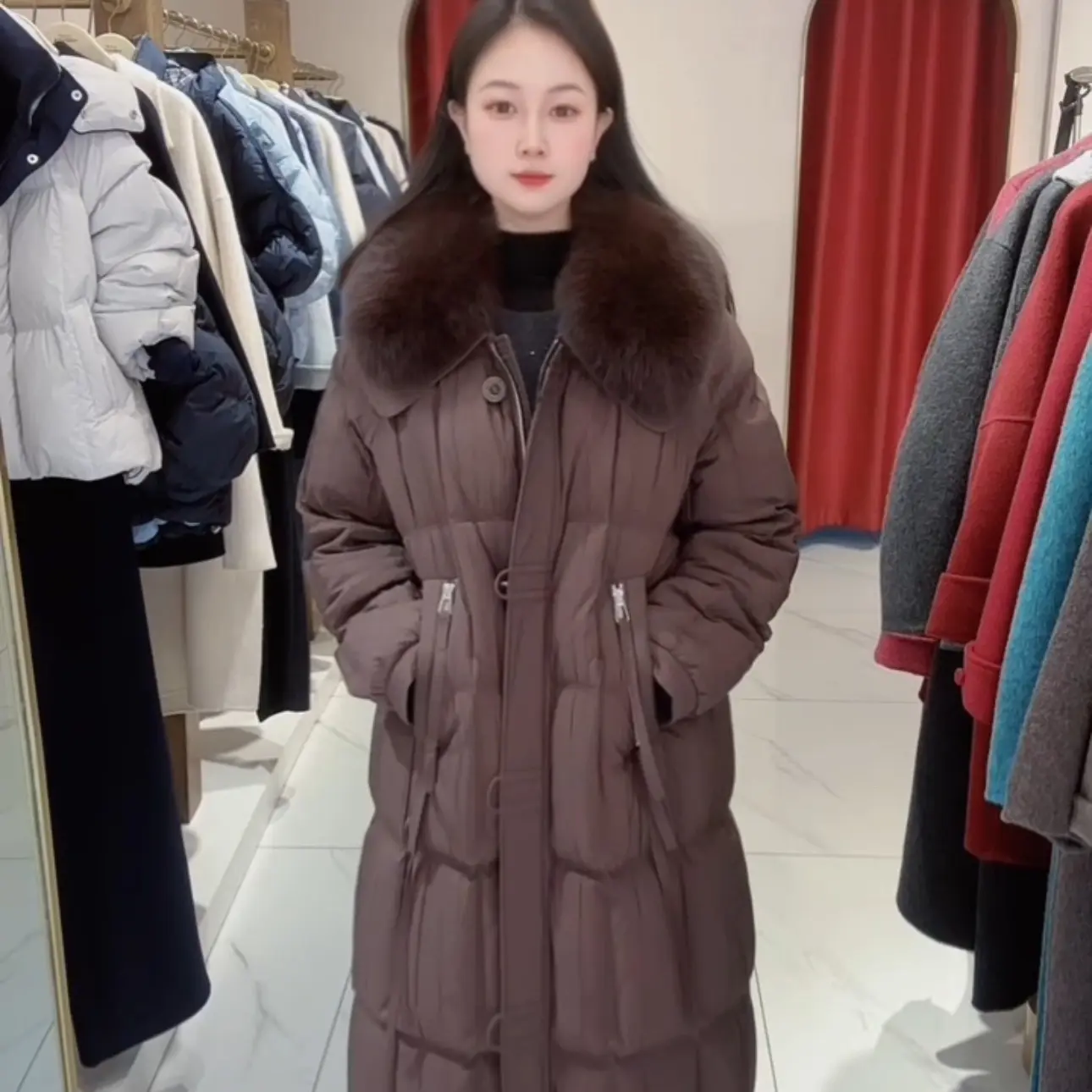 冬季女款长款加厚保暖狐狸毛领白鹅绒时尚简约羽绒服