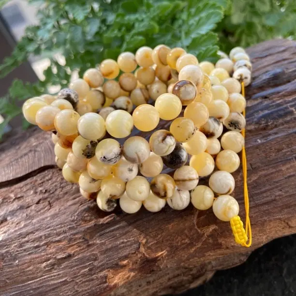 天然原矿沁色白蜜妖花108多圈佛珠