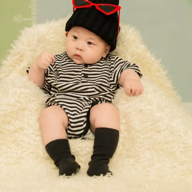 80克加棉卡通小马甲。