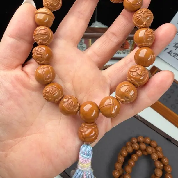 猴头雕刻哆啦A梦文玩手持微瑕(黑点反油，以直播间实物为准，不补籽