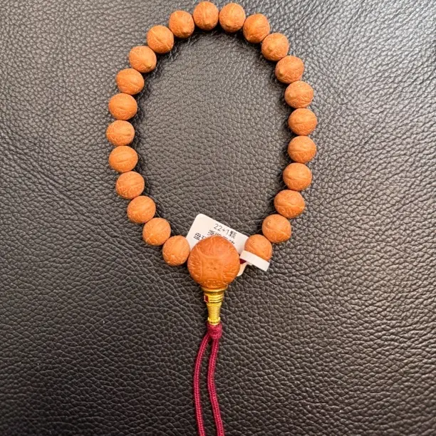 尼泊尔小凤眼同树实心悦心藏珍系列10.5-10.9精挑圆桩红皮23颗