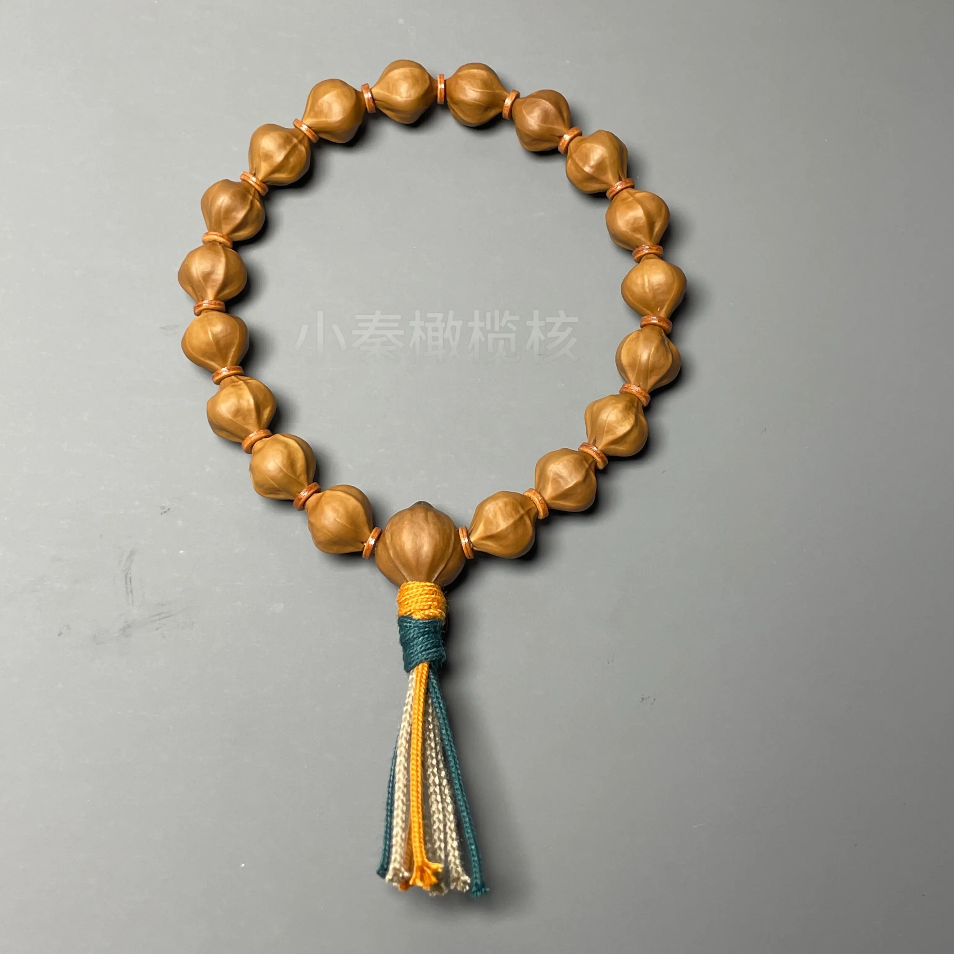 【小公主系列】1.0极限超小尺寸橄榄核蜜桃臀文玩素核手串