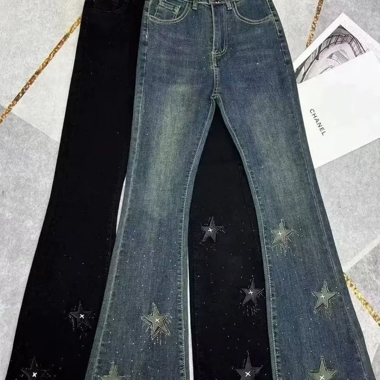 欧洲站烫钻微喇牛仔裤女2025年秋冬新款弹力高腰修身显瘦星星刺绣