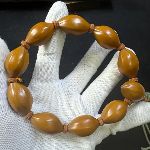 鸡血红高密橄榄核素串精抛光文玩手串男女款