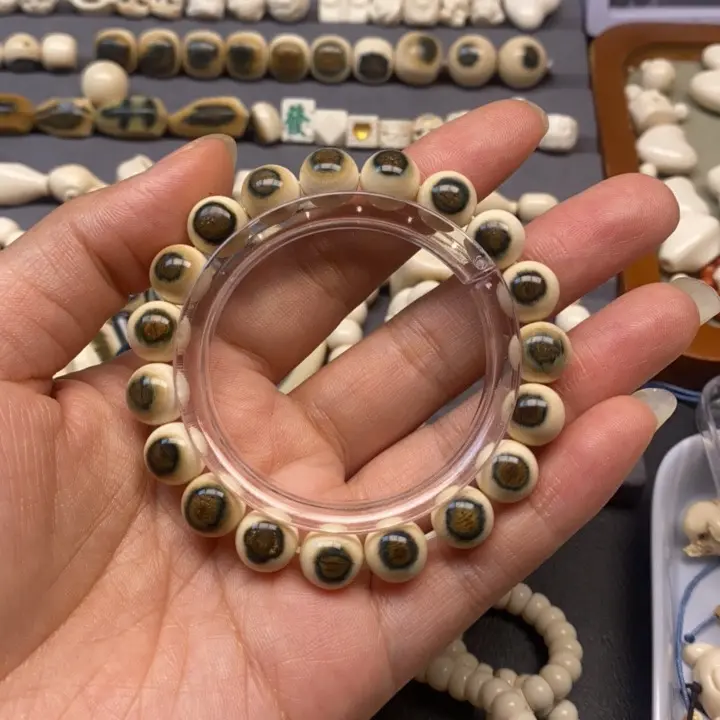 芯艺猛犸牙蓝眼手串