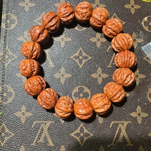 文玩核桃粗筋京八棱野生秋子手持盘玩手把件男