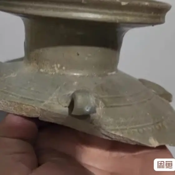 晋越窑青瓷鸡首壶残片