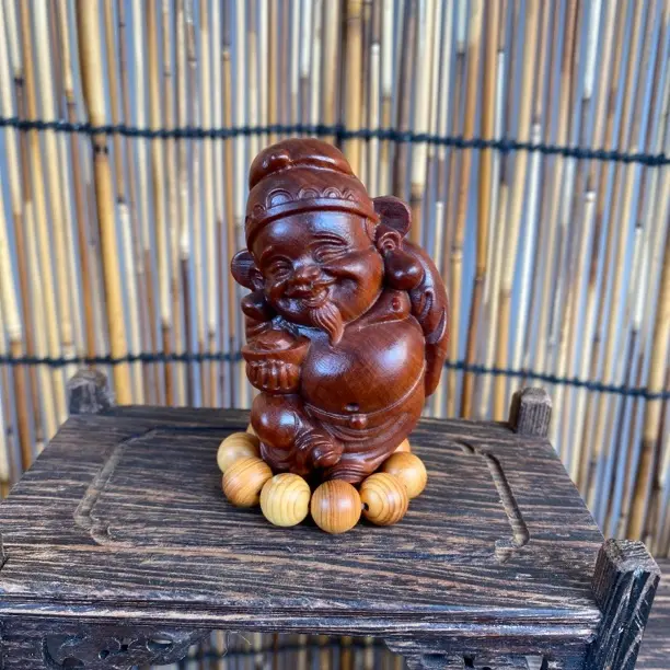 崖柏陈化黑油骨料财神手把件木雕工艺品