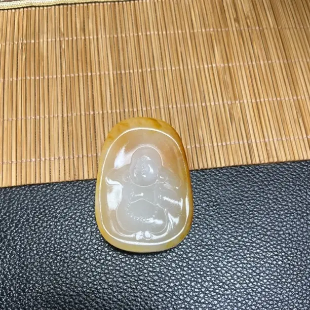 新疆和田玉弥勒佛手把件44克