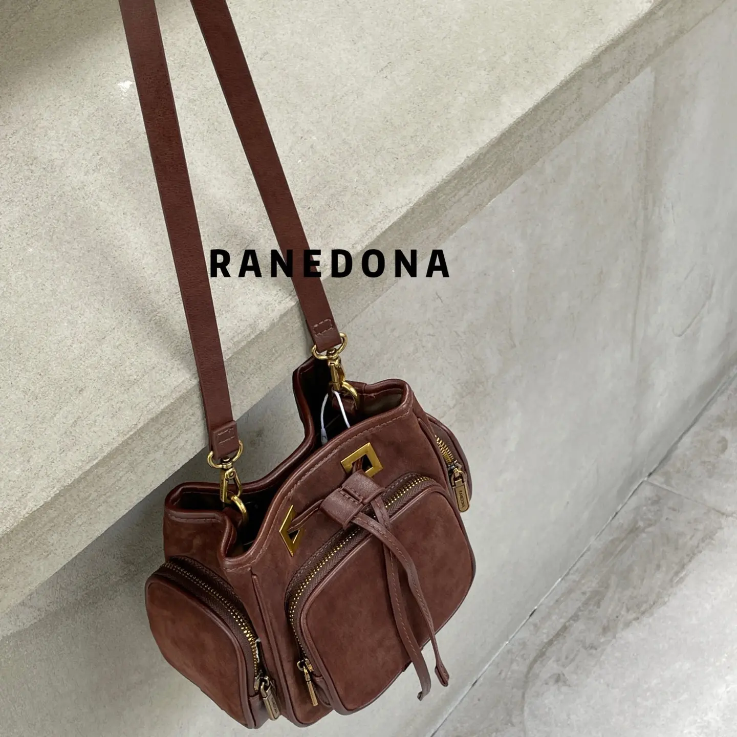 2025小众设计新款复古磨砂水桶包休闲百搭斜挎包63100