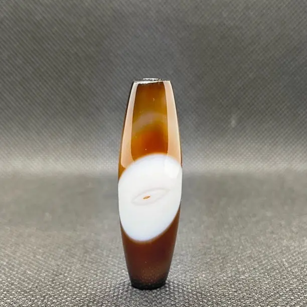 天然缠丝玛瑙一眼天珠，直径14.1mm对孔46.7mm