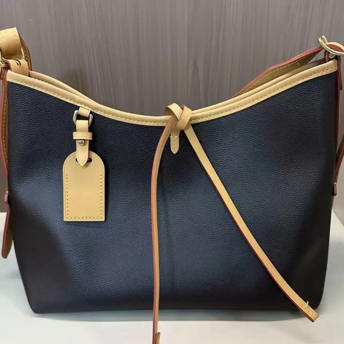 拉链水洗分层磁扣单根防尘单肩包水桶包大托特斜跨