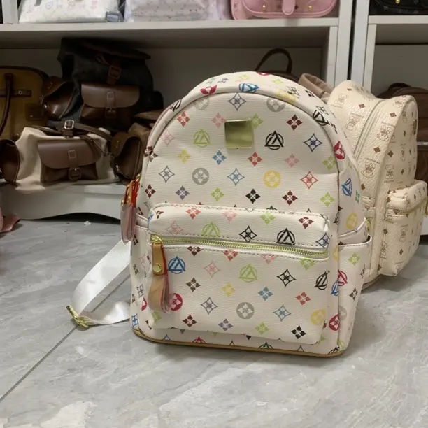 双肩包女卡通印花韩版ins少女学生百搭休闲潮流轻奢大容量背包