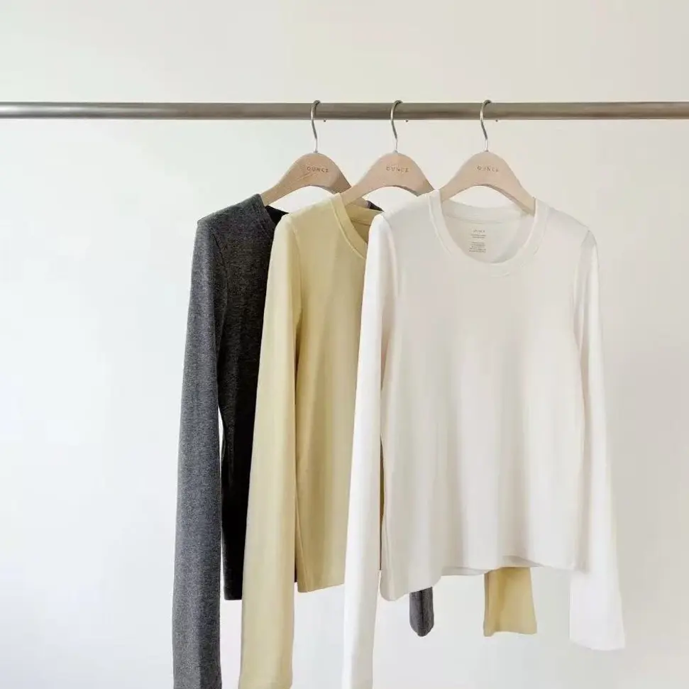 东大门oun秋冬圆领长袖百搭气质纯色针织打底衫（no退no换）