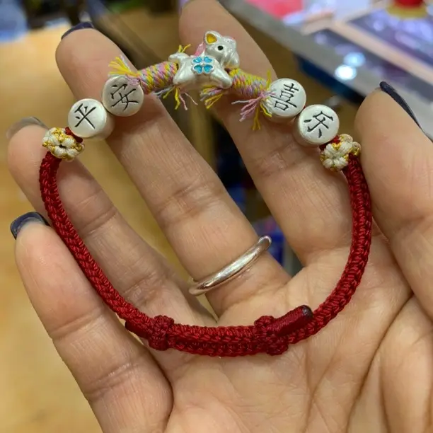 足银布艺手链 足银布艺手链足银999生肖马红绳手链手工编织礼物
