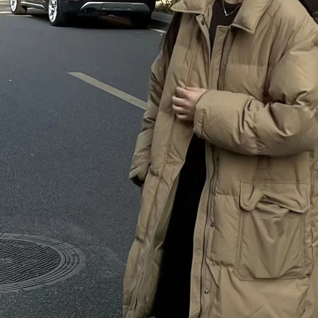 冬季简约纯色翻领女宽松保暖大口袋百搭中长款外套