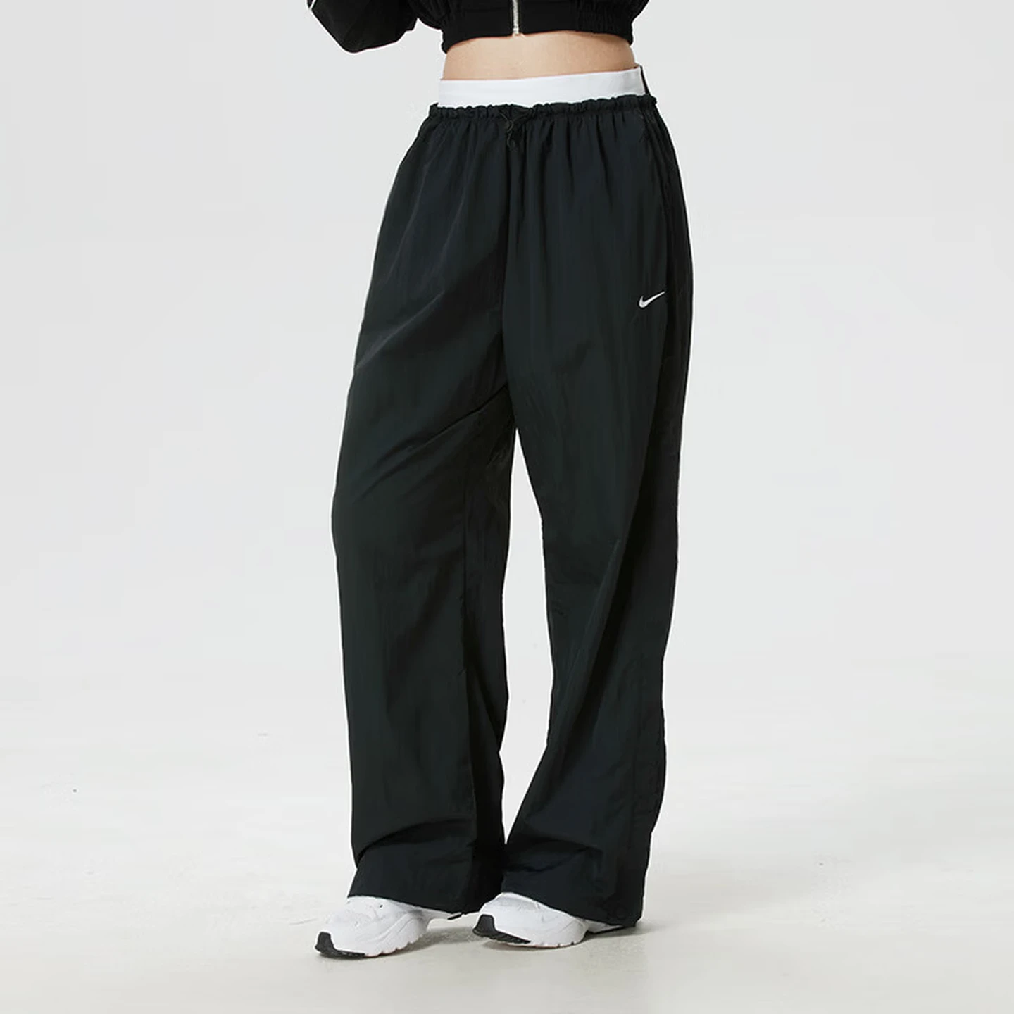 NIKE/耐克2026春女运动宽松直筒舒适透气休闲梭织长裤 IF0335010