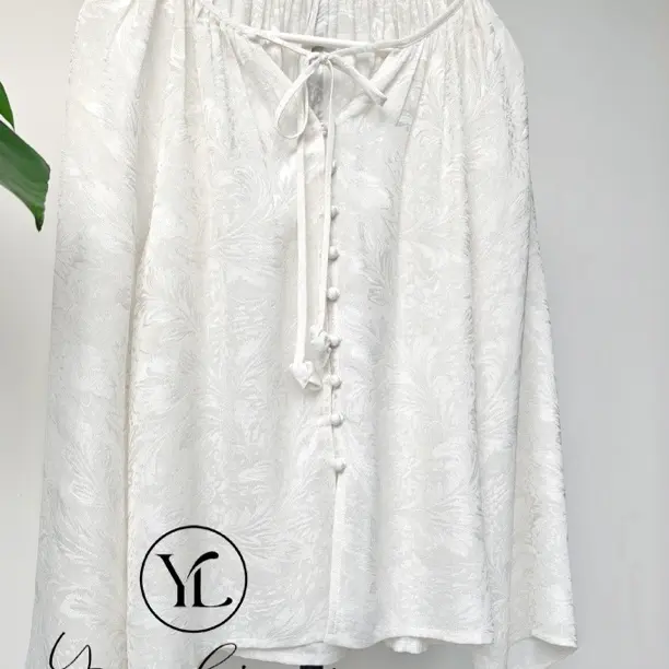 白色银丝星羽流光上衣