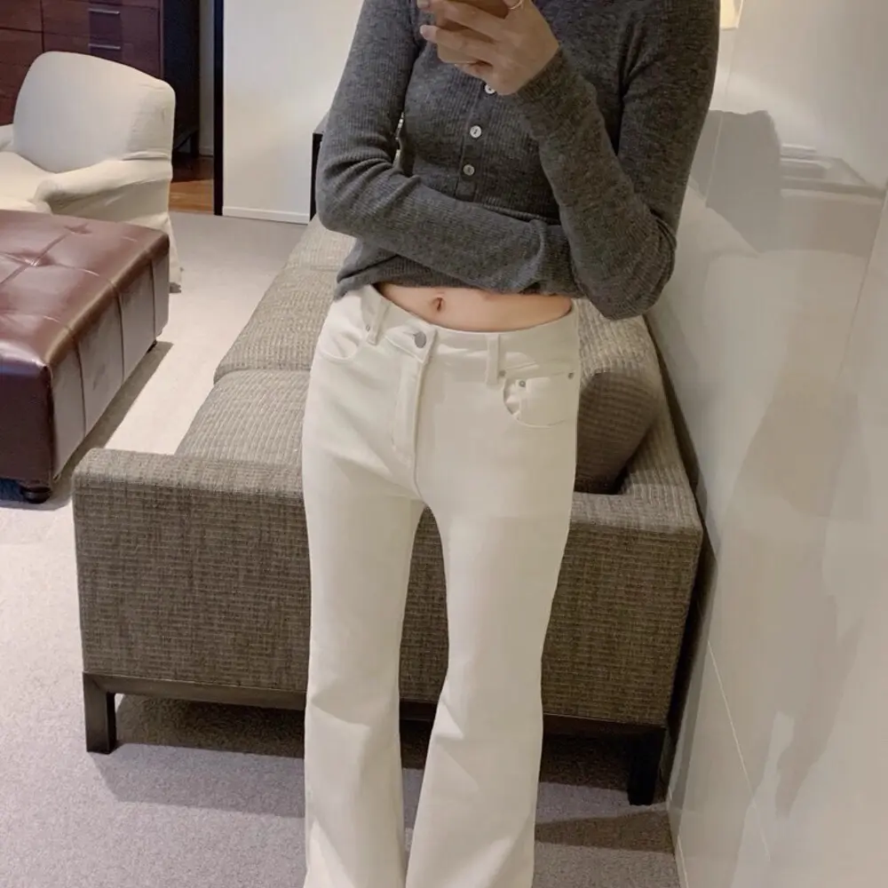 冬季加绒燕麦色高腰显瘦弹力修身微喇牛仔裤