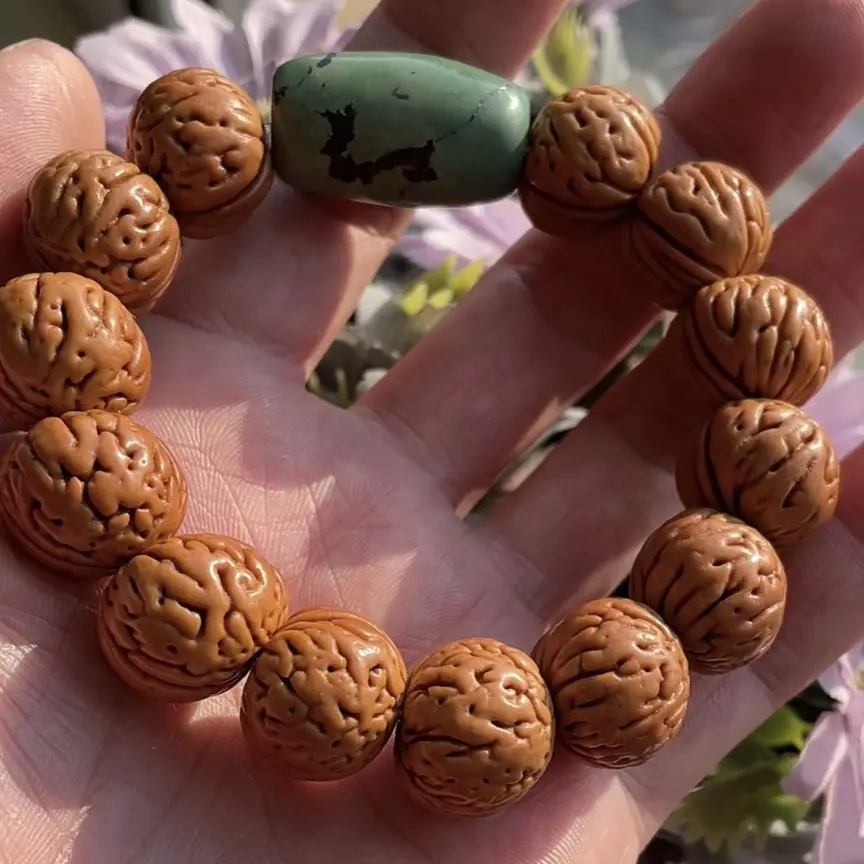 回血 元宝桃核精挑手串 尺寸1.8 搭配：松石