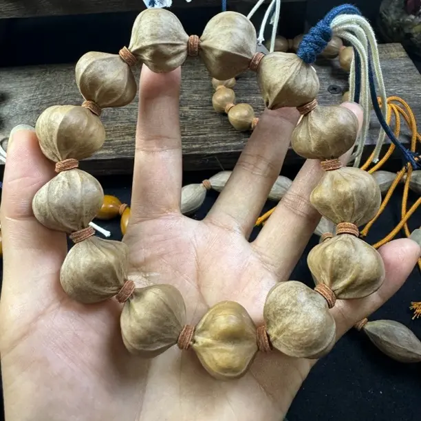 橄榄核素串文玩手链鲨鱼背皮质红润饱满