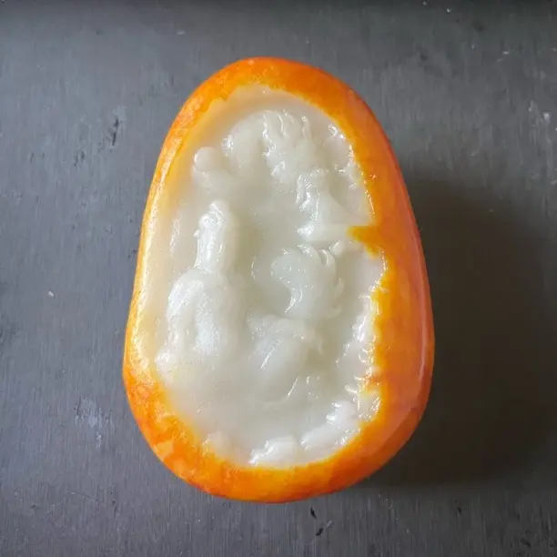 新疆和田玉玉龙观音手把件251克