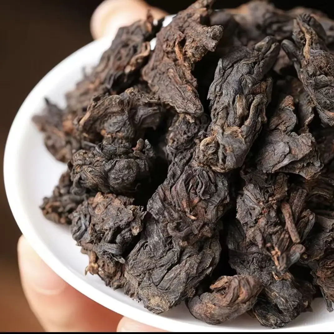 2012年纯手工陈年普洱熟茶樟香金芽老茶头