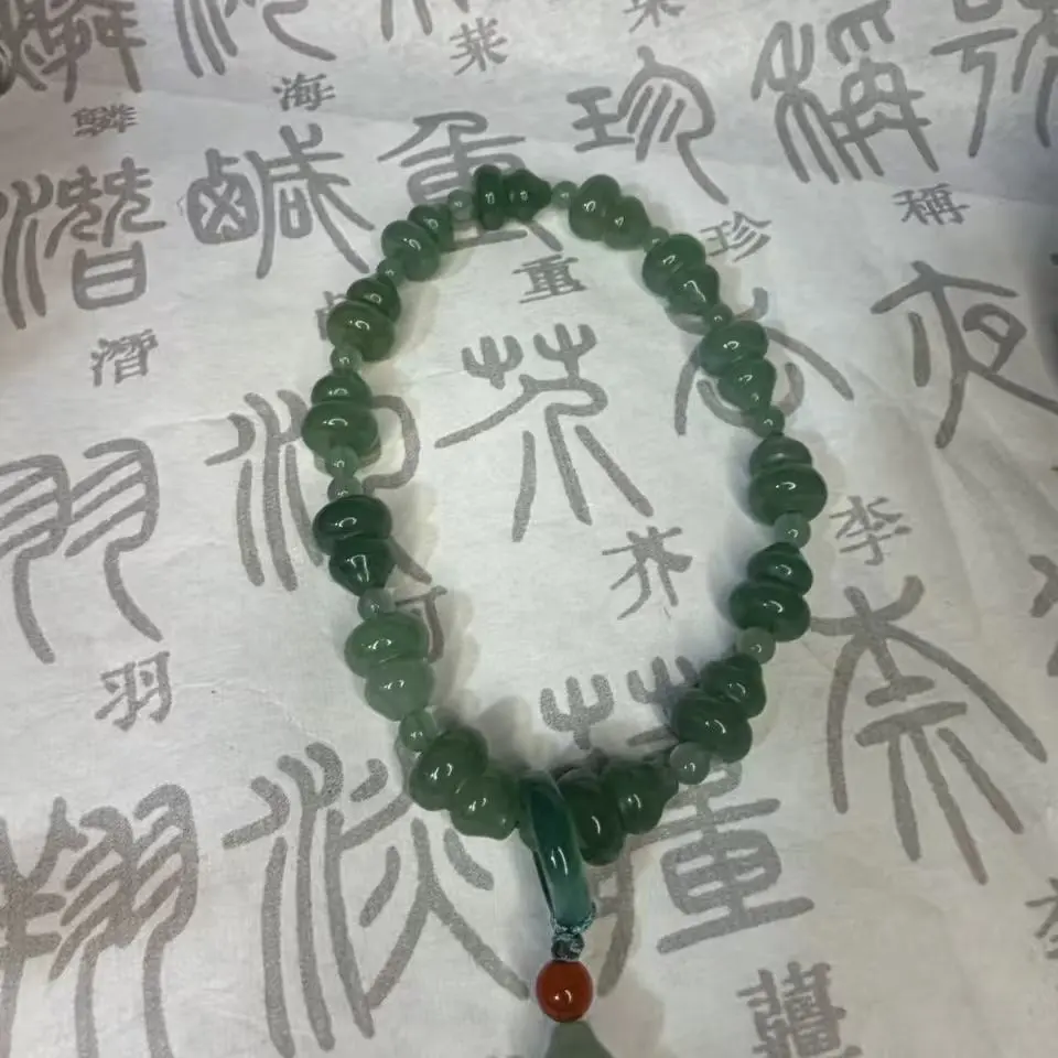 新中式复古小众女款简约百搭老料东陵玉手持