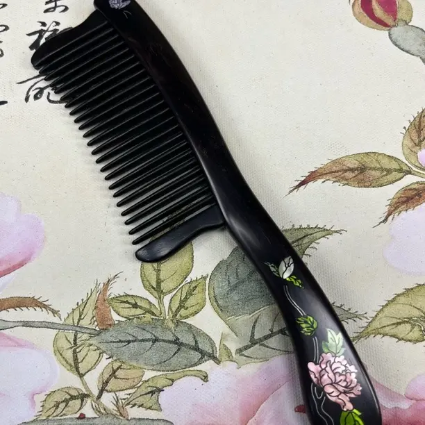 紫光檀木镶嵌插齿长柄花开富贵款木梳