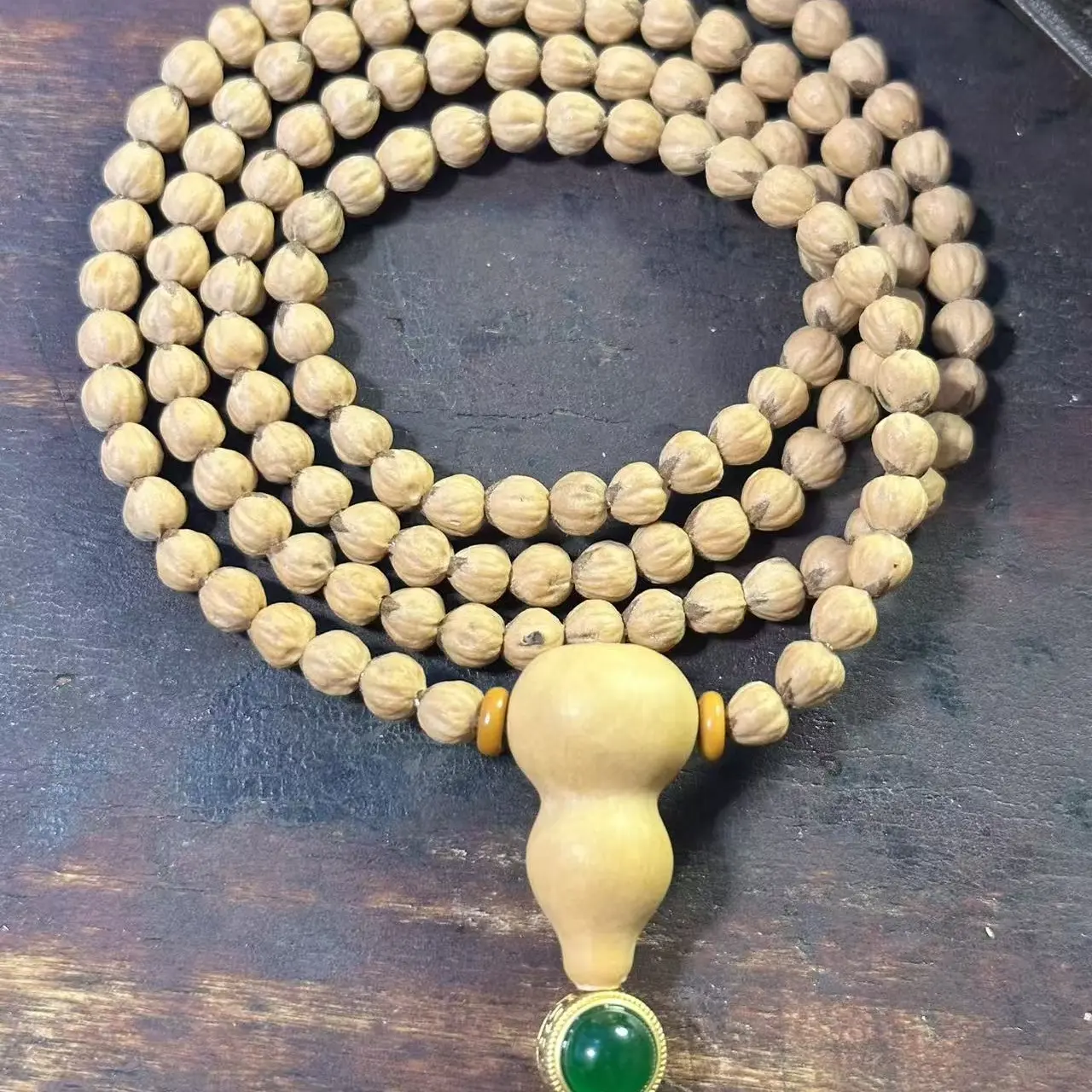 西藏热振百香籽深坑鬼脸原生态手串