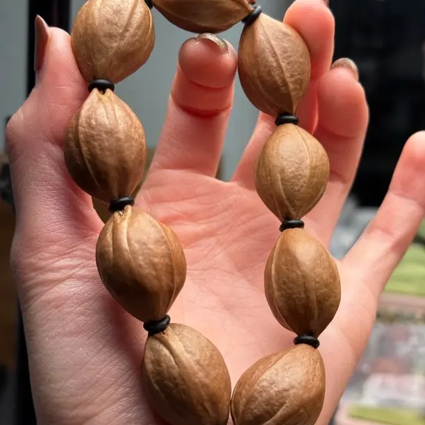 橄榄核雕刻原皮素串手串