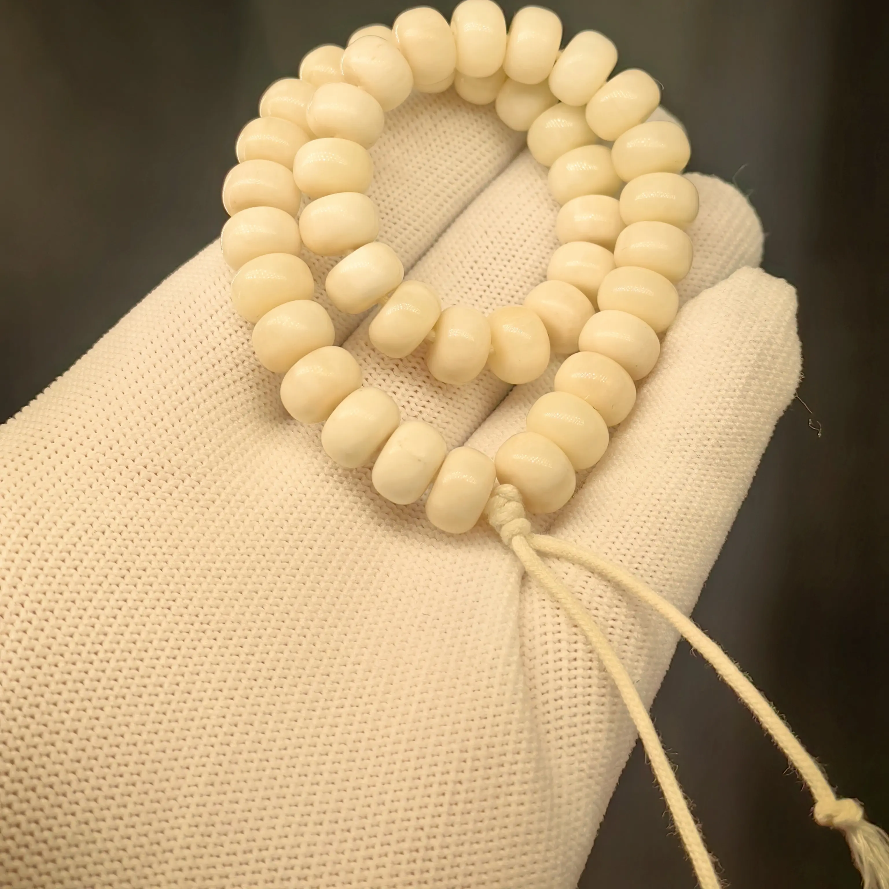 牛骨老料，桶形珠，尺寸9.6*6.5左右，微棕原色未漂白