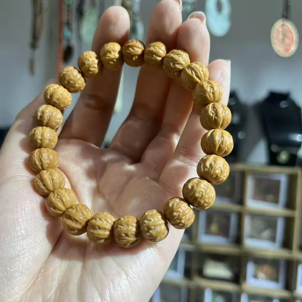 猴头核桃京八棱尺寸11+mm猴头文玩手串雕刻单圈微瑕黑点猴头手串